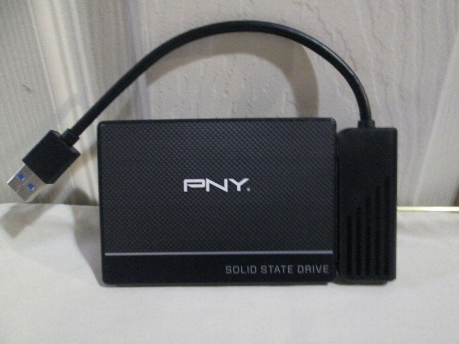 PNY 500GB INTERNAL SSD DRIVE AND TRANSFER CABLE  OPEN BOX-NEVER USED.