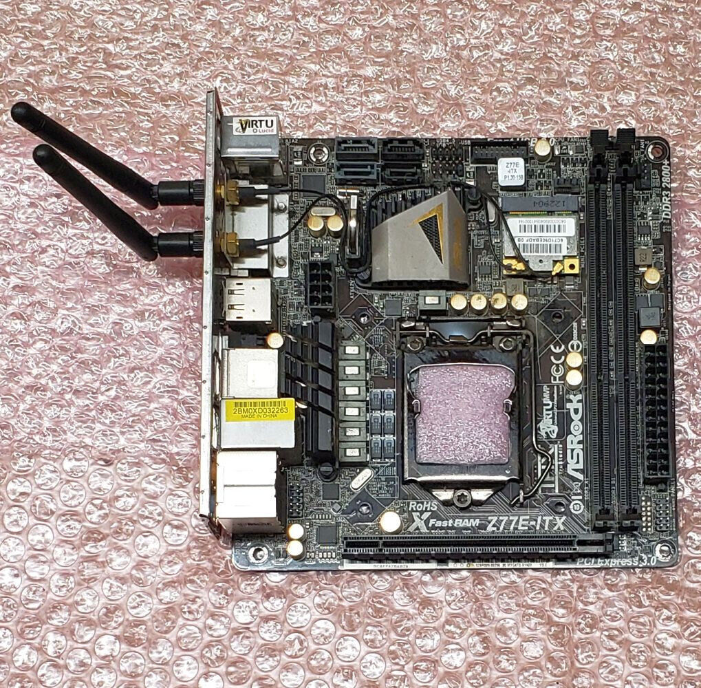 Working Asrock Z77E-ITX Intel LGA 1155 Mini ITX motherboard w/ WiFi & I/O shield