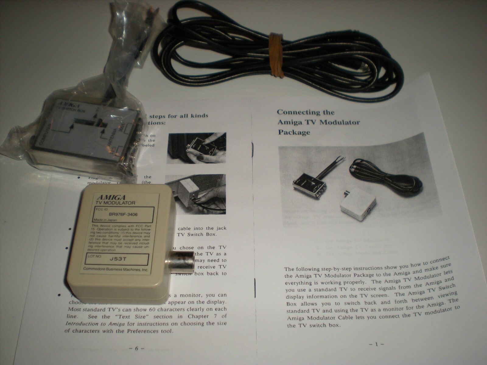 Amiga 1000 RF modulator. Connects Amiga 1000 to old televisions. With cable.   