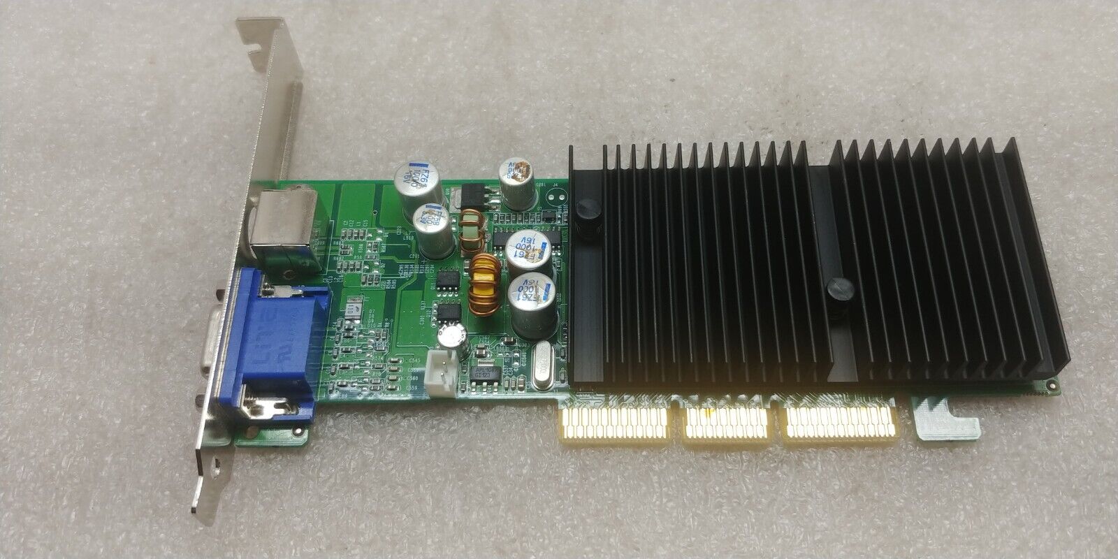 EVGA E-GEFORCE FX 5200 128MB AGP 4X/8X NVIDIA GRAPHICS CARD VGA S-VIDEO ZZ6-3(7)