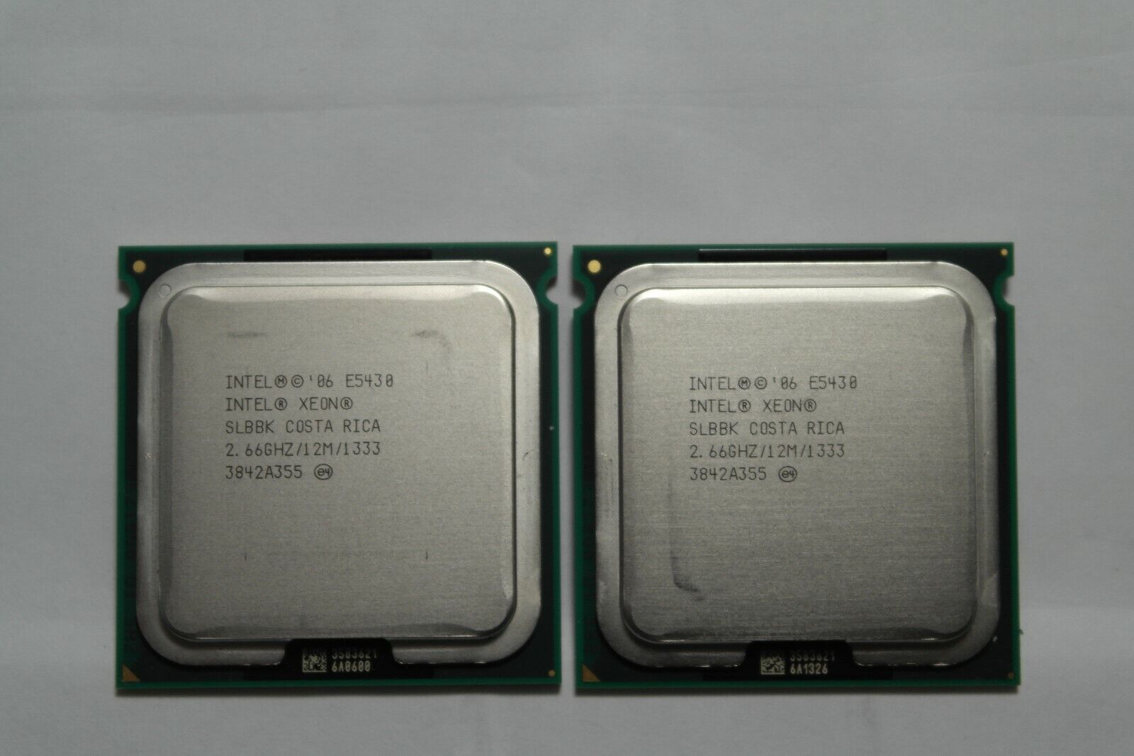 Matched Pair of Intel Xeon E5430 2.66GHz Quad-Core SLBBK Processor w/Grease