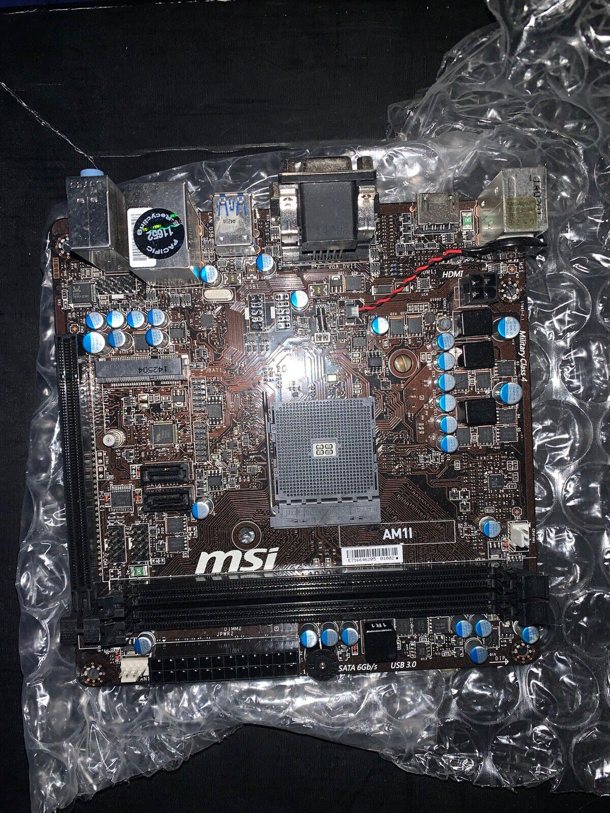 MSI AM1I, AMD Motherboard. Factory New. Never Used.
