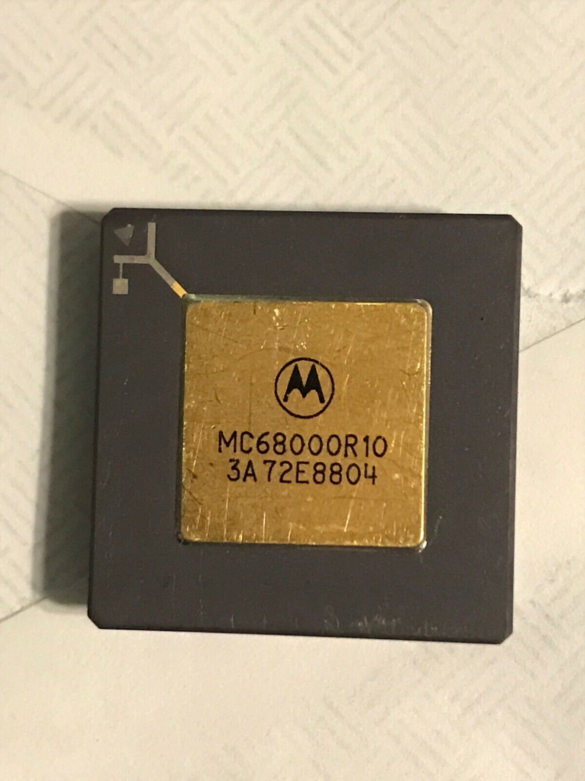 Vintage Motorola MC68000R10 68000 CPU in purple ceramic and gold PGA package