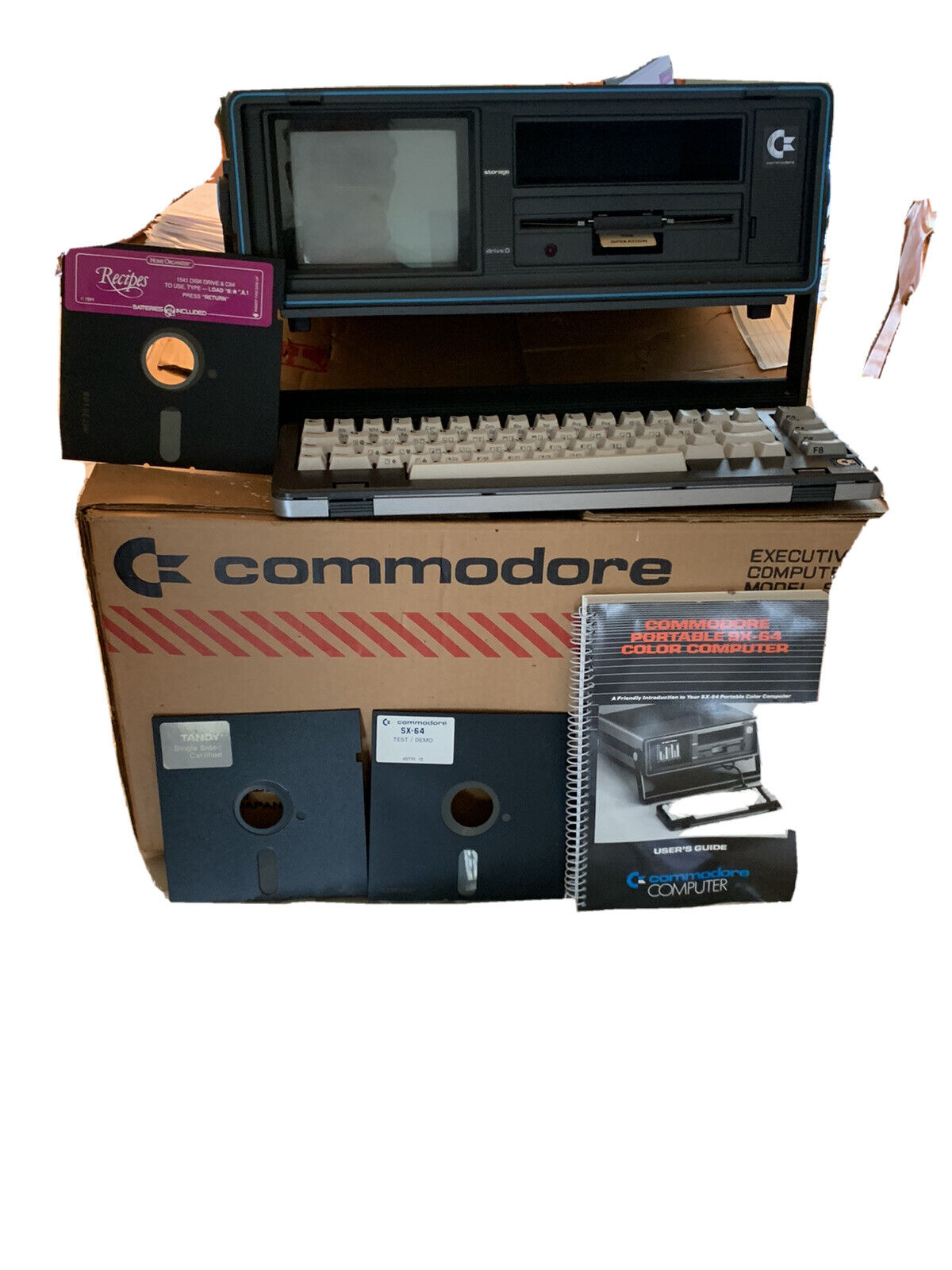 commodore 64 vintage computers mainframes with manual, floppy discs, keyboard
