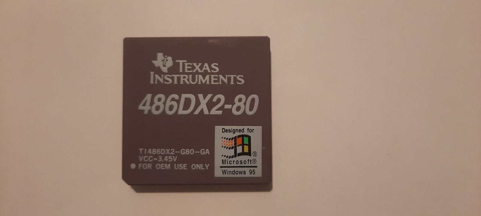 TI486DX2-G80-GA 486DX2-80 WIN95 logo Texas Instruments vintage CPU GOLD