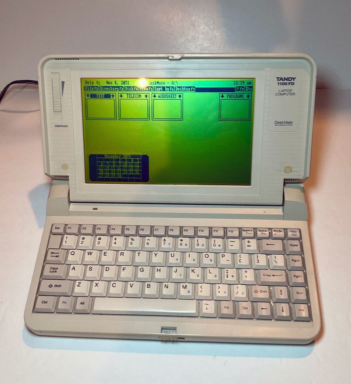 Tandy 1100 FD portable laptop computer bundled with manuals - works great