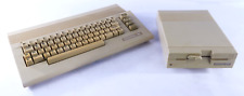 Vintage Commodore C64C Computer & 1541-II Floppy Drive Bundle picture