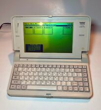Tandy 1100 FD portable laptop computer bundled with manuals - works great picture