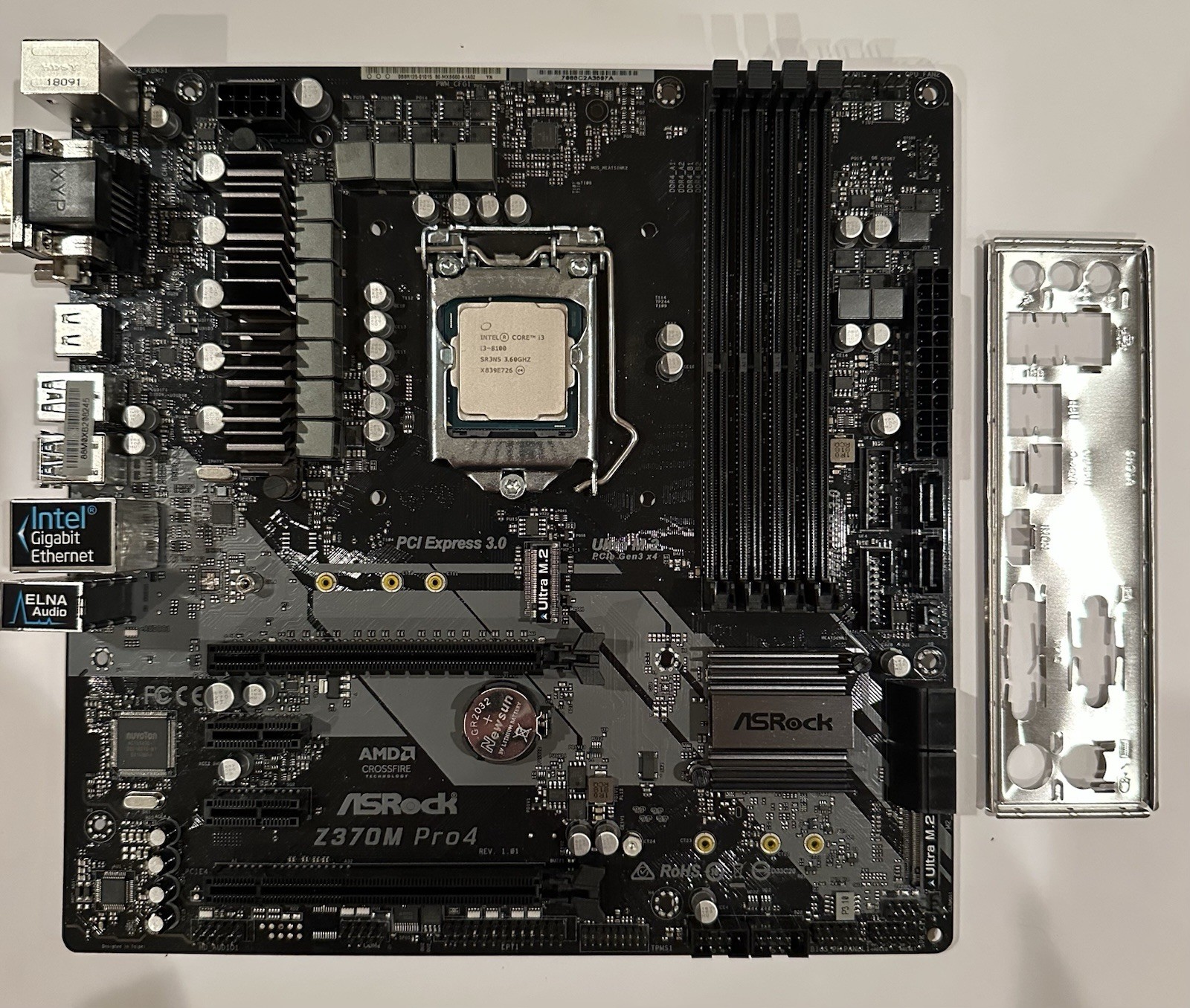 ASRock Z370M Pro4 Desktop Motherboard + Intel Core i3-8100 - Includes I/O Shield ASRock Z370M Pro4 Desktop Motherboard + Intel Core i3-8100 - Includes I/O Shield