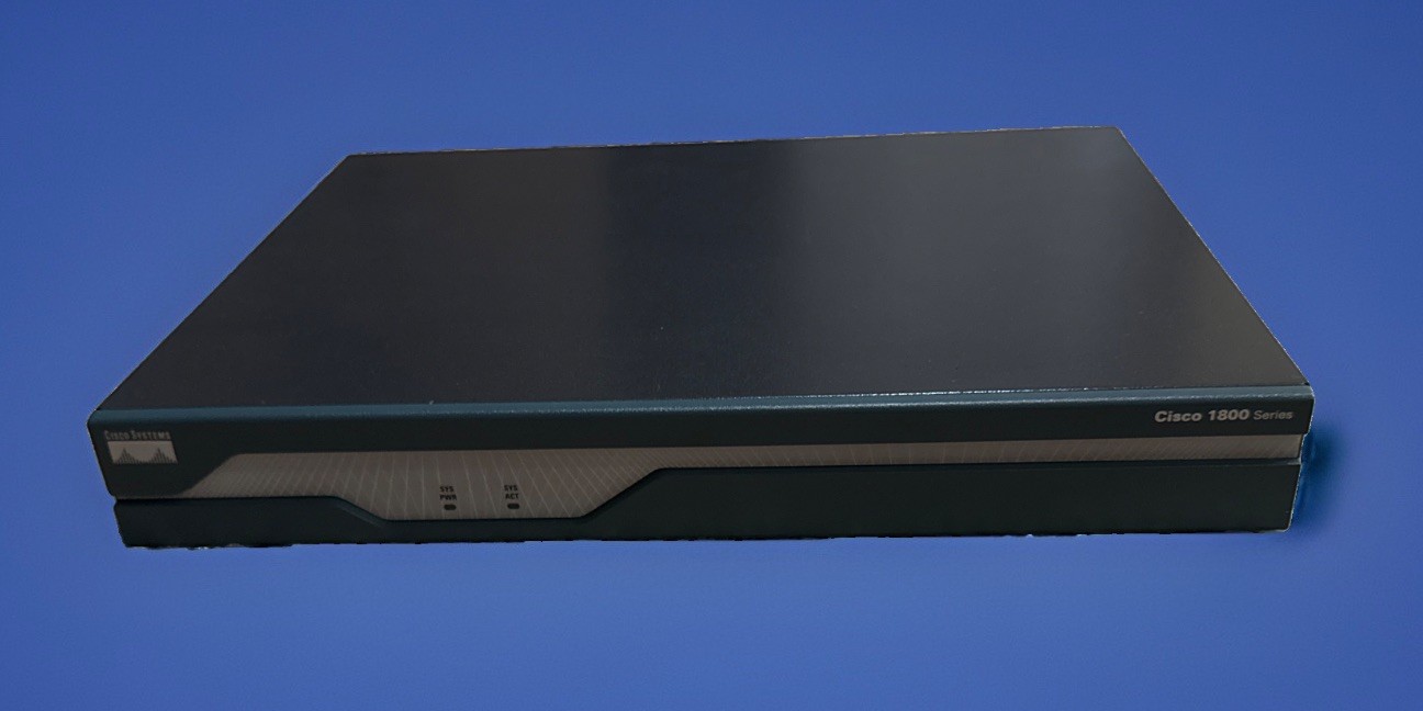 Cisco 1800 1841 Integrated Services Router 128D/64F  1x VWIC2-1MFT-T1/E1 Reset