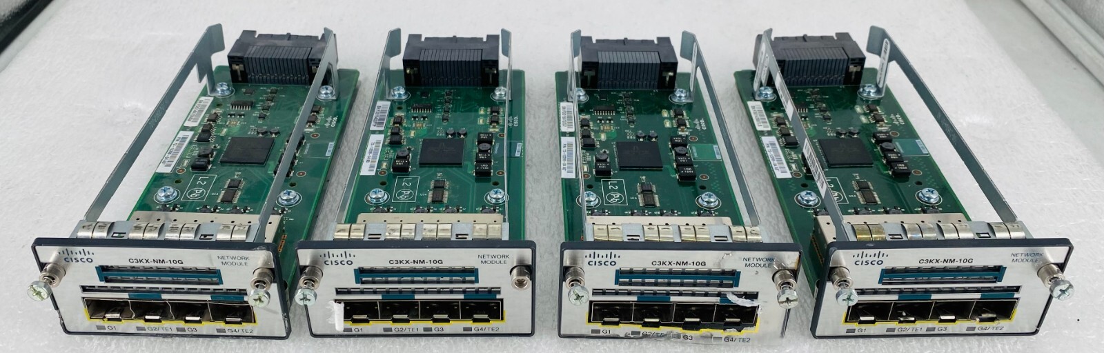 LOT OF 4 CISCO C3KX-NM-10G SFP+ EXPANSION MODULES *SEE PICTURES* LOT OF 4 CISCO C3KX-NM-10G SFP+ EXPANSION MODULES *SEE PICTURES*