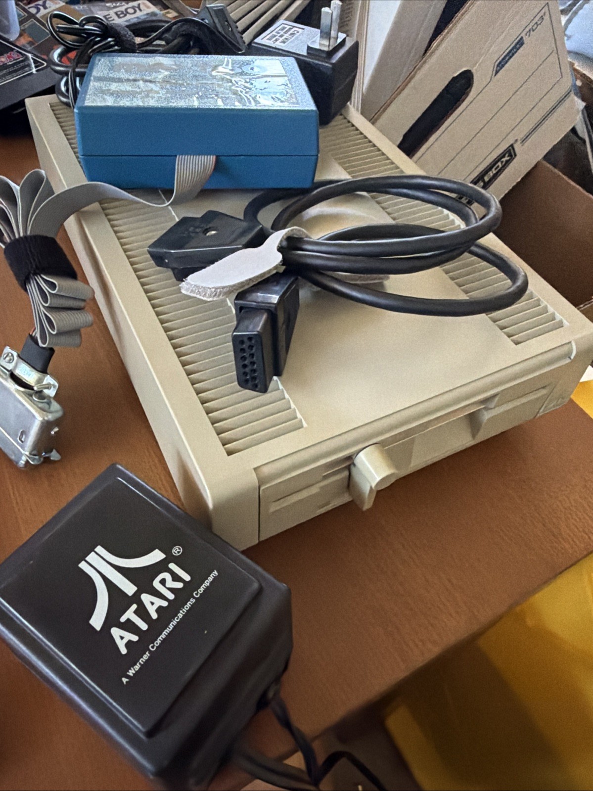 ATARI XF551 DISK DRIVE WITH AC POWER ADAPTER AND PARALLEL PORT ADAPTER, UNTESTED ATARI XF551 DISK DRIVE WITH AC POWER ADAPTER AND PARALLEL PORT ADAPTER, UNTESTED