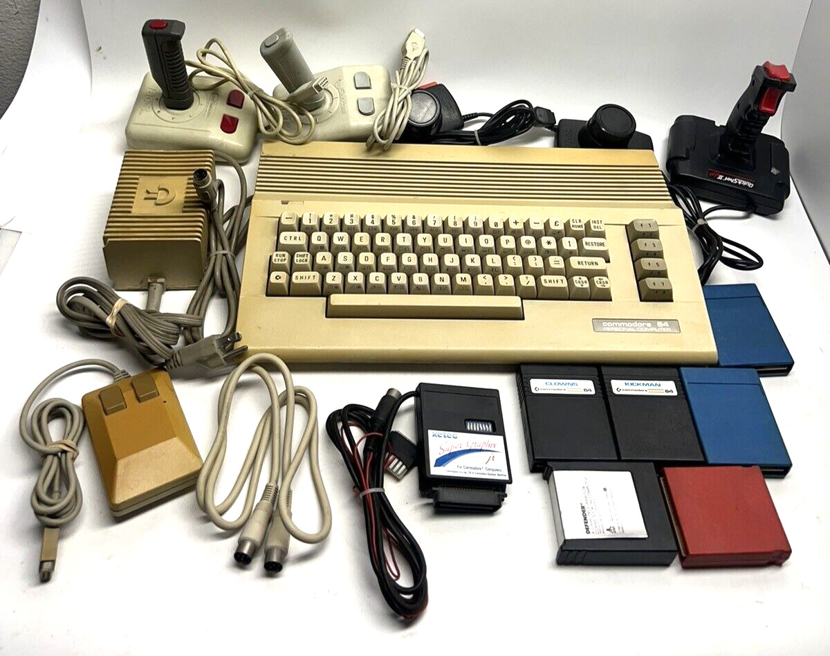 DEFECT  Commodore 64 64C Computer W/ Power Supply, Mouse, Joysticks, 7 Games....